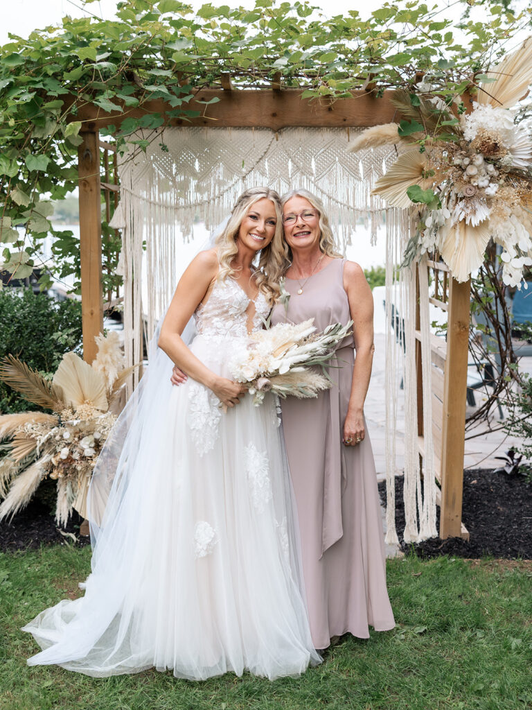 wedding arbor with macrame backdrop