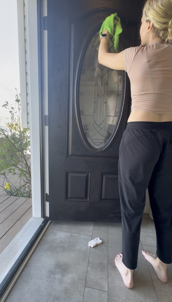 prepping for faux wood paint technique on front door