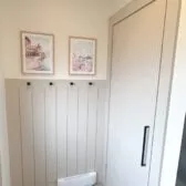 Entryway makeover with shiplap accent wall and reed molding closet door
