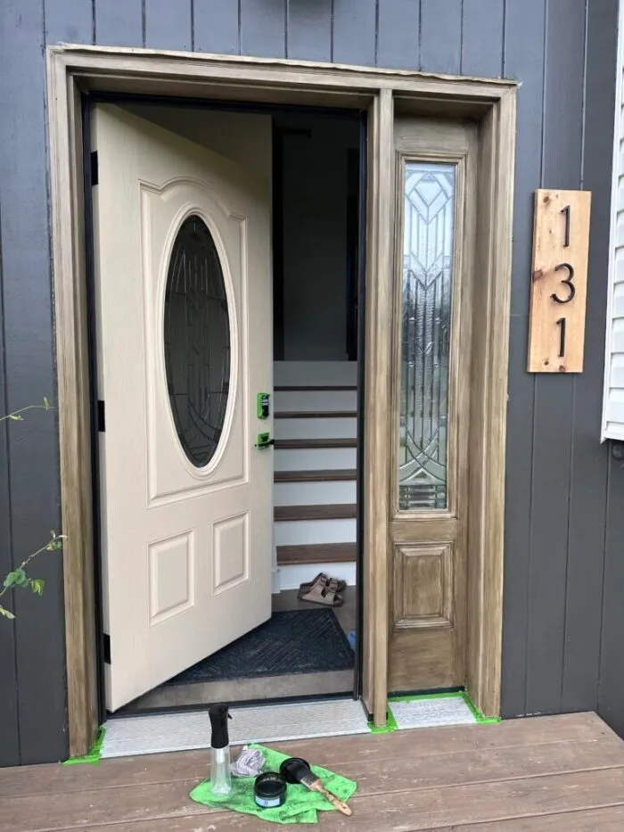 faux wood with primer and stain to create faux wood DIY door - retique it