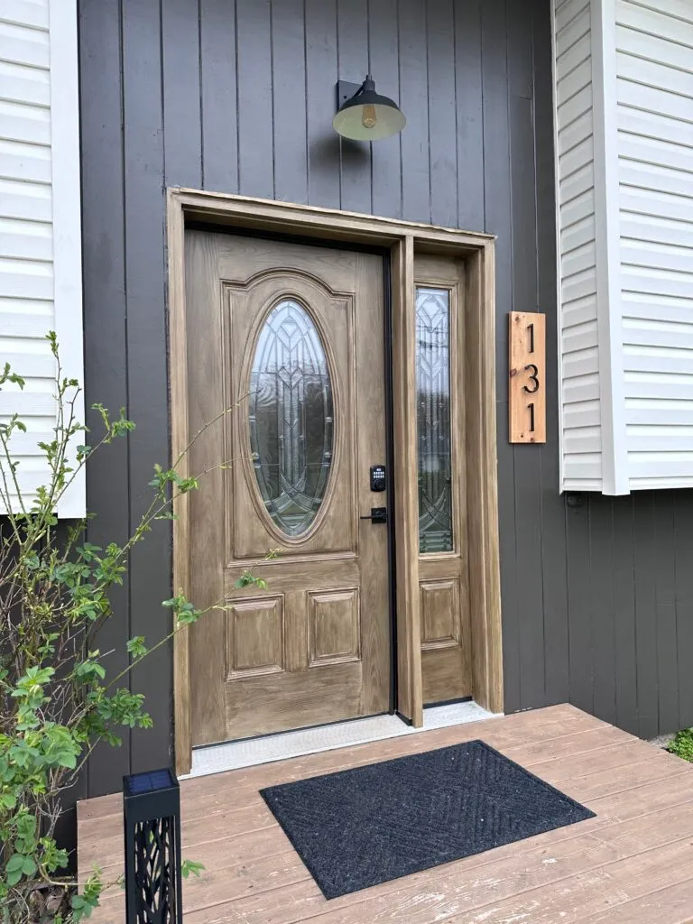 paint that looks like wood- faux wood painting technique on front door
