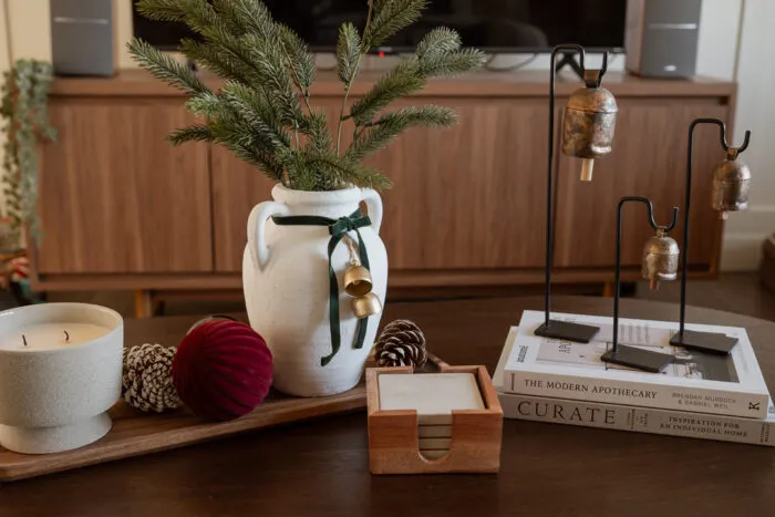 add vintage bells and velvet to vase